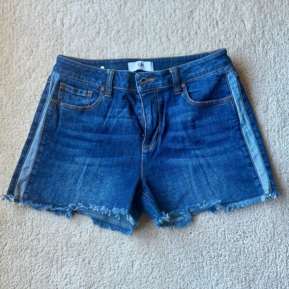 CAbi Women's Blue Jean Shorts with Frayed Hem. Size 4